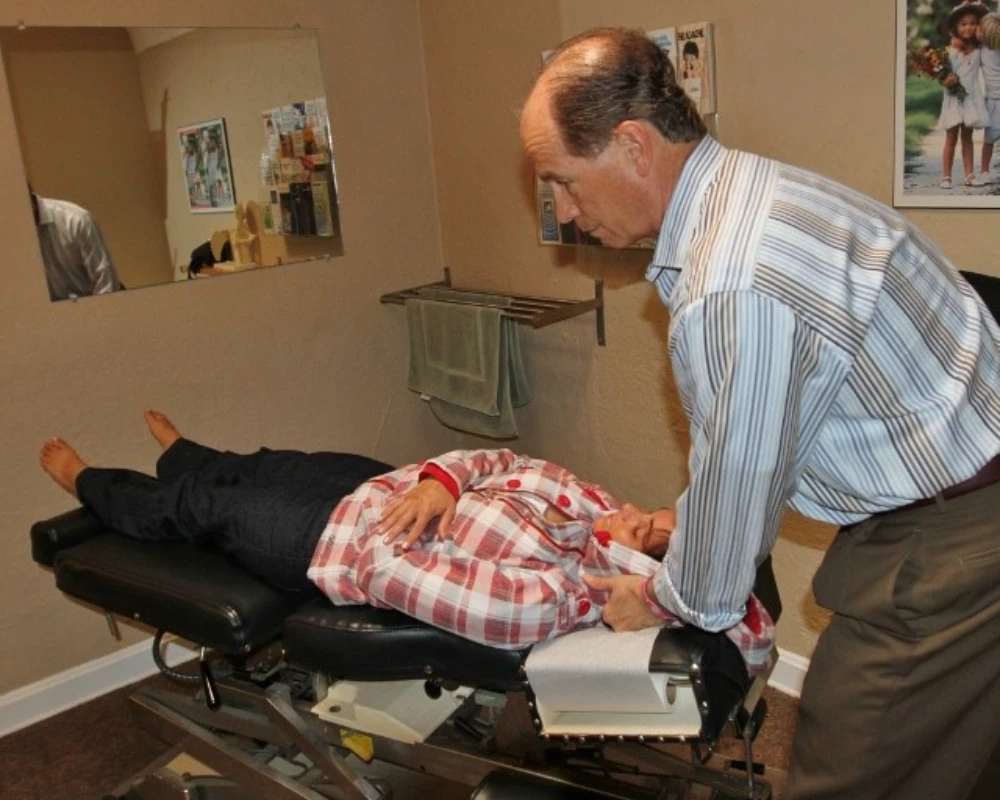 Neck Pain Treatment of Patient by Doctor at Leucadia Chiropractic Wellness Clinic